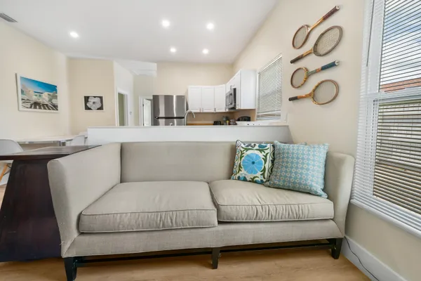 a living room with furniture and a table