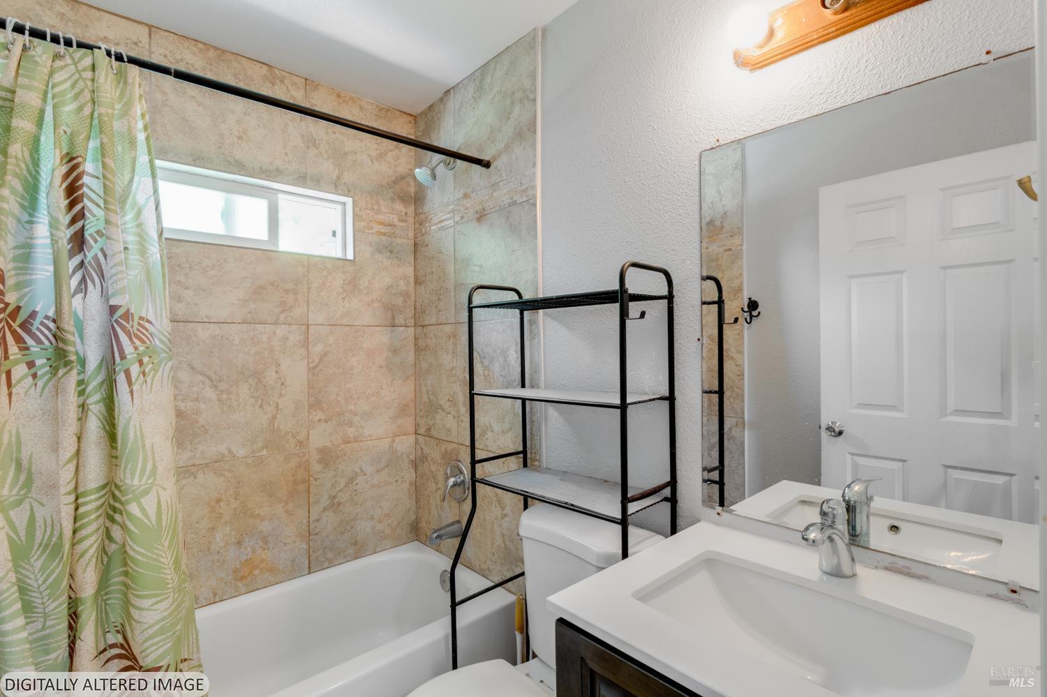 1722 Indiana Street Fairfield, CA 94533 - Photo 14 of 18 a bathroom with a sink and a mirror