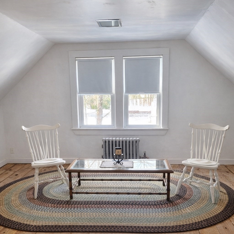 260 Elm Street Walpole, MA 02081 - Photo 21 of 32 a living room with furniture and a window