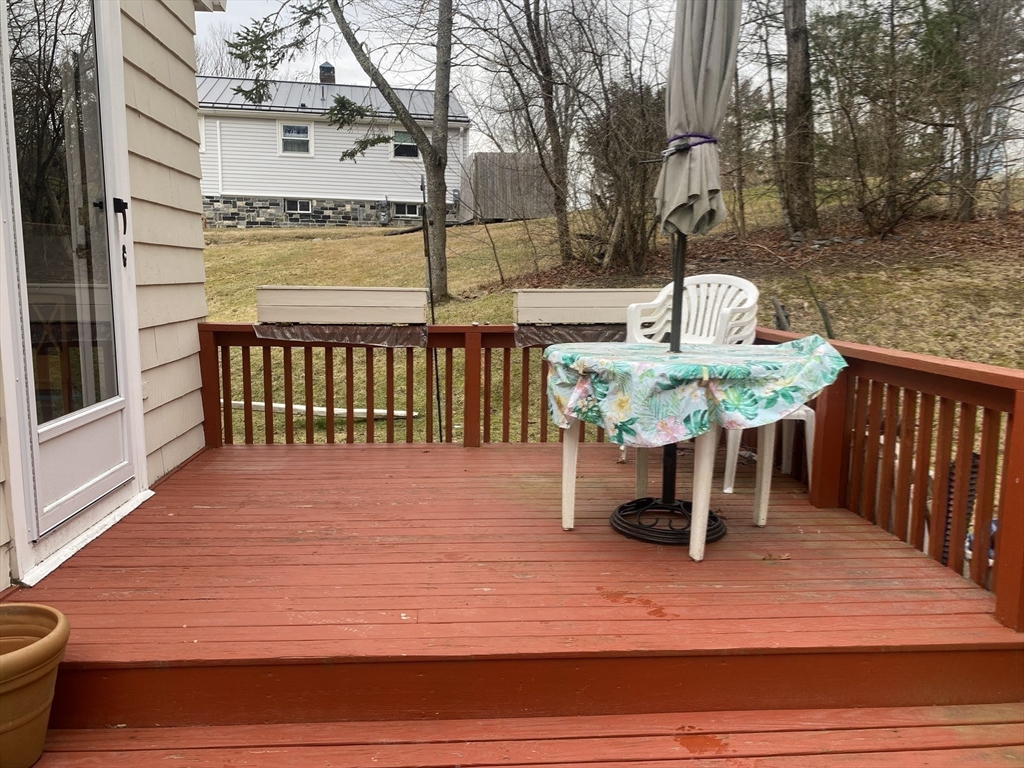 260 Elm Street Walpole, MA 02081 - Photo 30 of 32 a view of a patio with iron fence