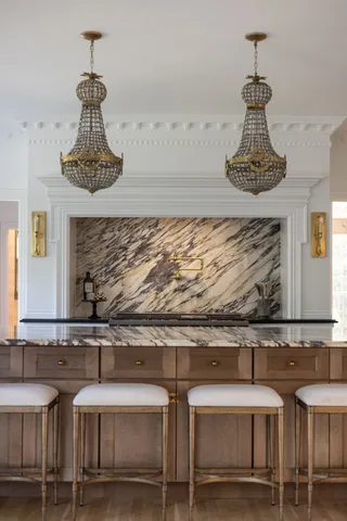 a kitchen with stainless steel appliances granite countertop a stove and a sink