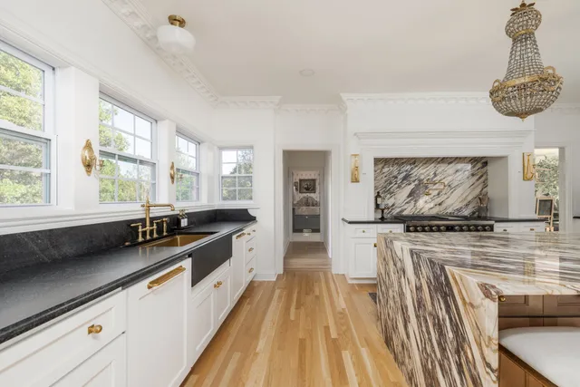a bathroom with a sink and mirror