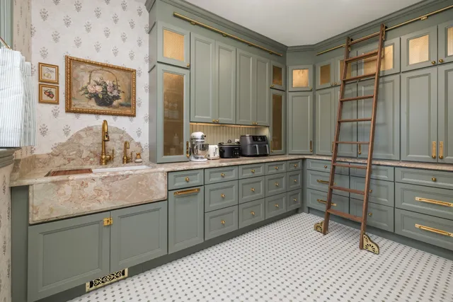 a kitchen with a cabinets and window