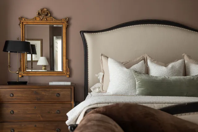 a spacious bathroom with a double vanity sink a mirror and a bathtub