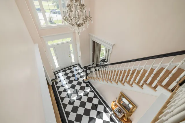a bathroom with a sink a mirror and shower