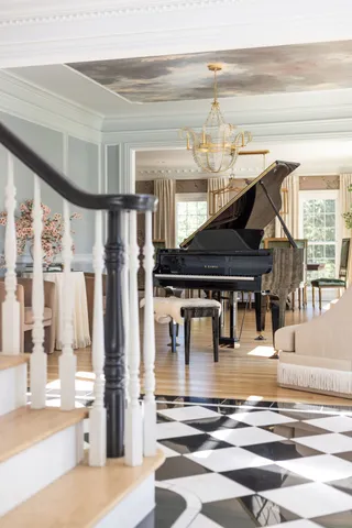 a view of a living room and entry way