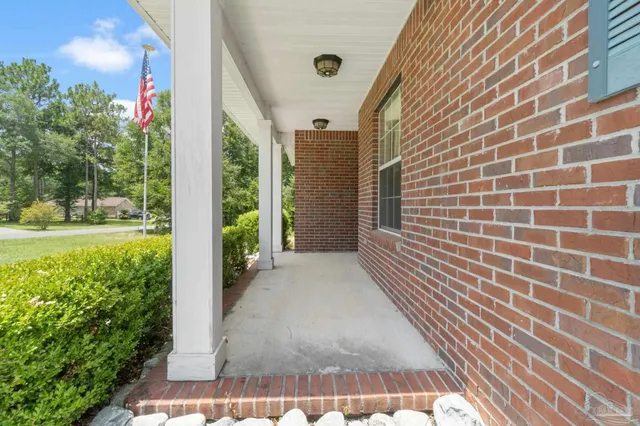 a view of a pathway both side of house