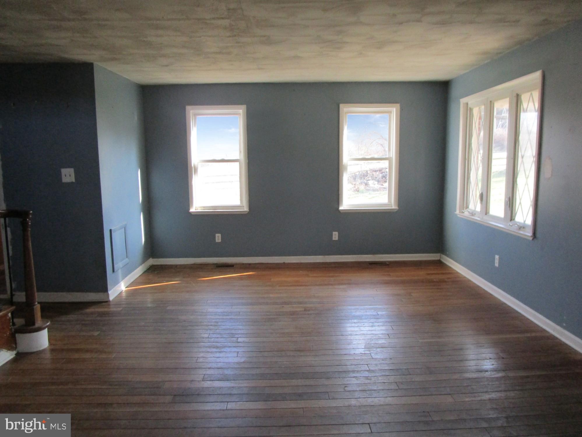 243 Porters Bridge Road Colora, MD 21917 - Photo 8 of 36 Lots of windows in the living room