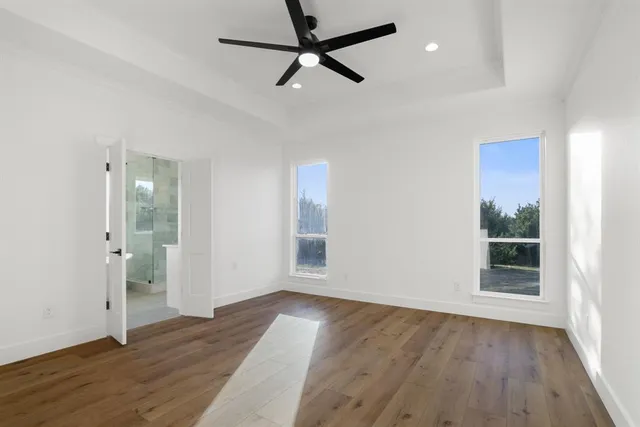 a bathroom with a sink a shower and a mirror
