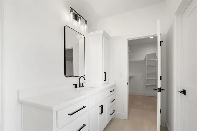 a view of an empty walk in closet