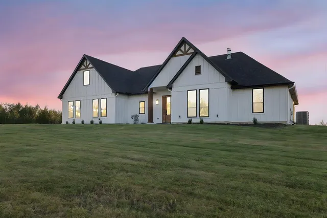 a view of livingroom with wooden floor and window