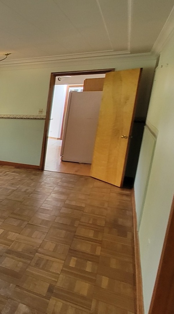 24049 West Grass Lake Road Antioch, IL 60002 - Photo 6 of 26 a view of water heater room with wooden floor