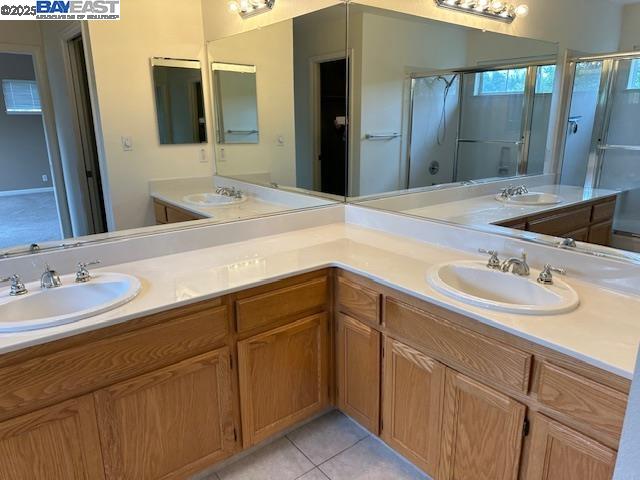 7187 Briza Loop San Ramon, CA 94582 - Photo 17 of 23 a bathroom with a sink and a mirror