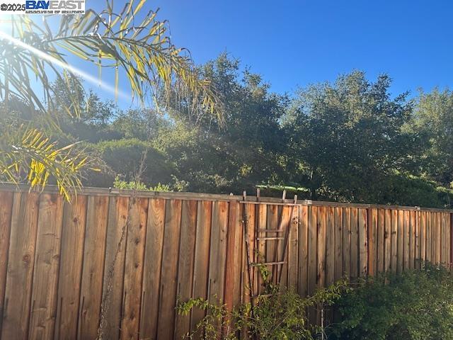 7187 Briza Loop San Ramon, CA 94582 - Photo 20 of 26 a view of a wooden fence