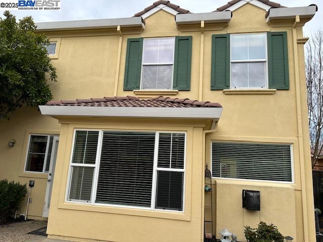 7187 Briza Loop San Ramon, CA 94582 - Photo 22 of 23 a front view of a house with a garage