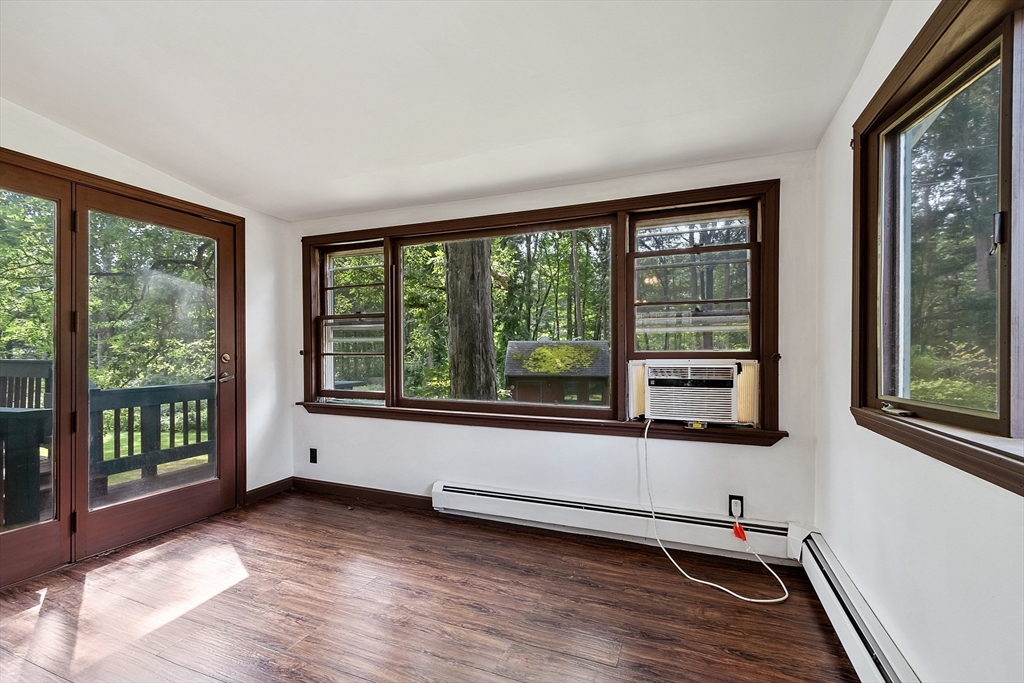 25 Cushing Street Salisbury, MA 01952 - Photo 23 of 40 a view of a room with wooden floor and windows