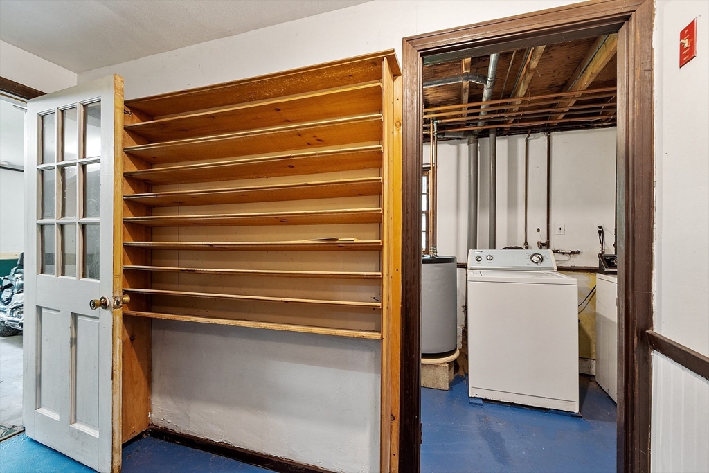25 Cushing Street Salisbury, MA 01952 - Photo 27 of 40 a view of walk in closet with empty racks