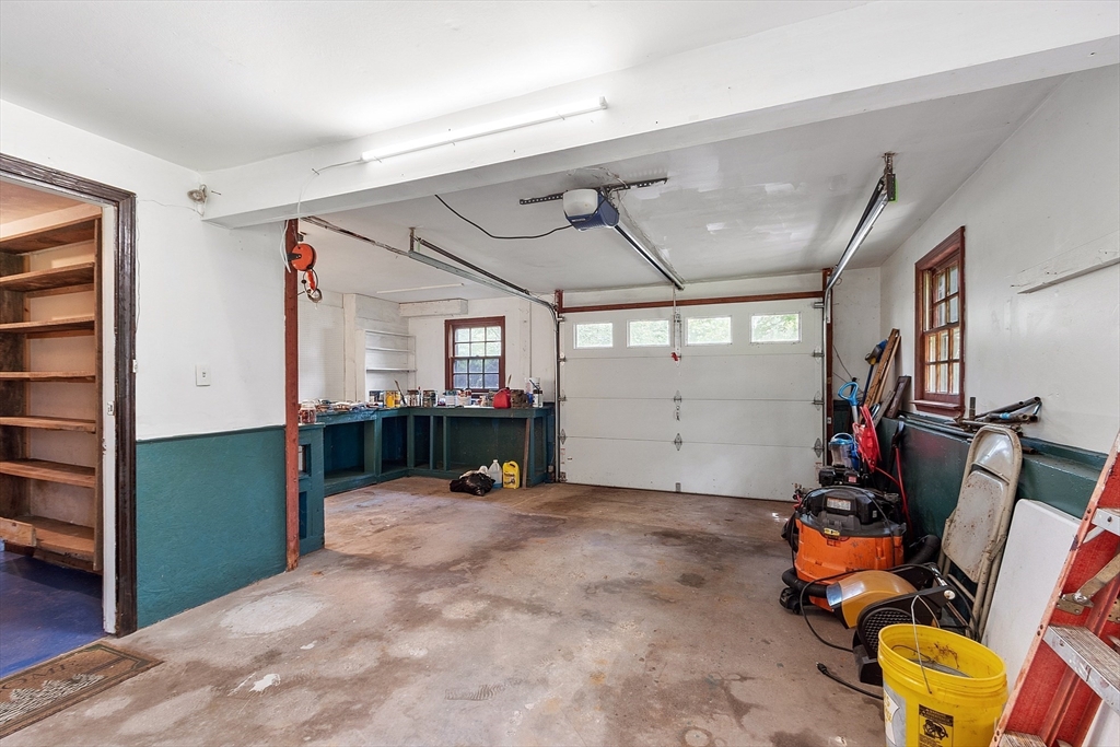 25 Cushing Street Salisbury, MA 01952 - Photo 34 of 40 a view of a room with workspace and windows