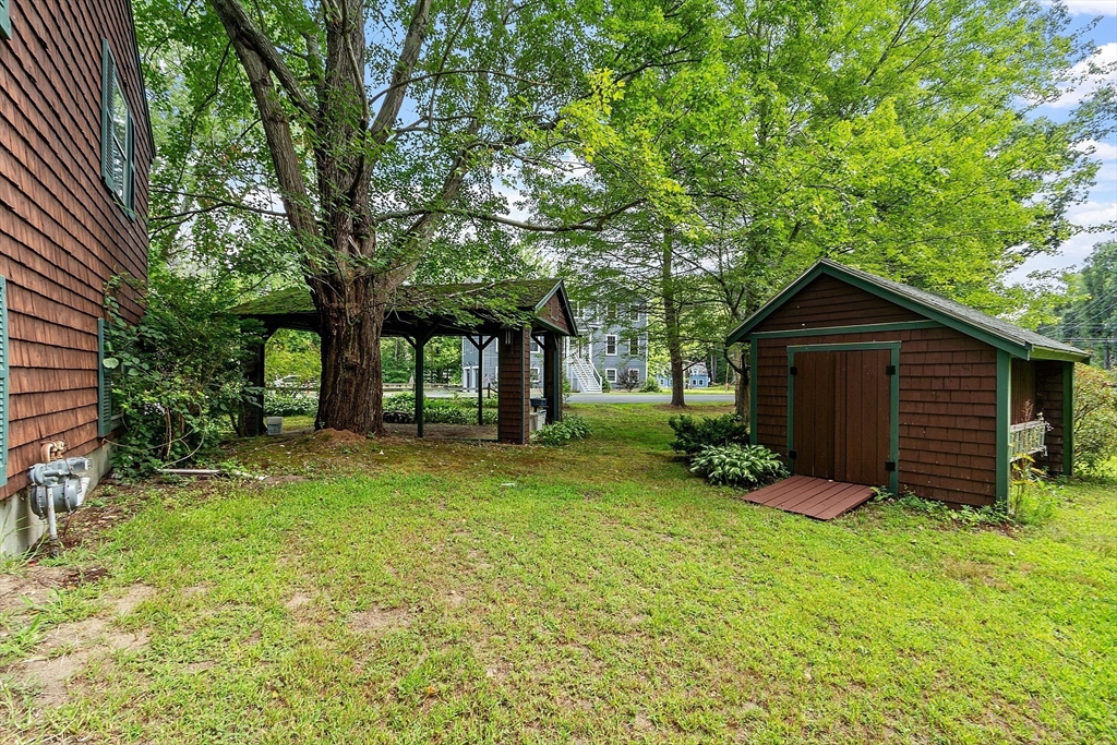 25 Cushing Street Salisbury, MA 01952 - Photo 38 of 40 a view of a house with backyard and garden