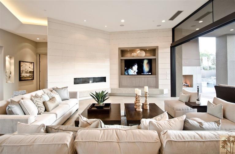 34 Sun Ridge Circle Rancho Mirage, CA 92270 - Photo 21 of 38 a living room with furniture and a large window