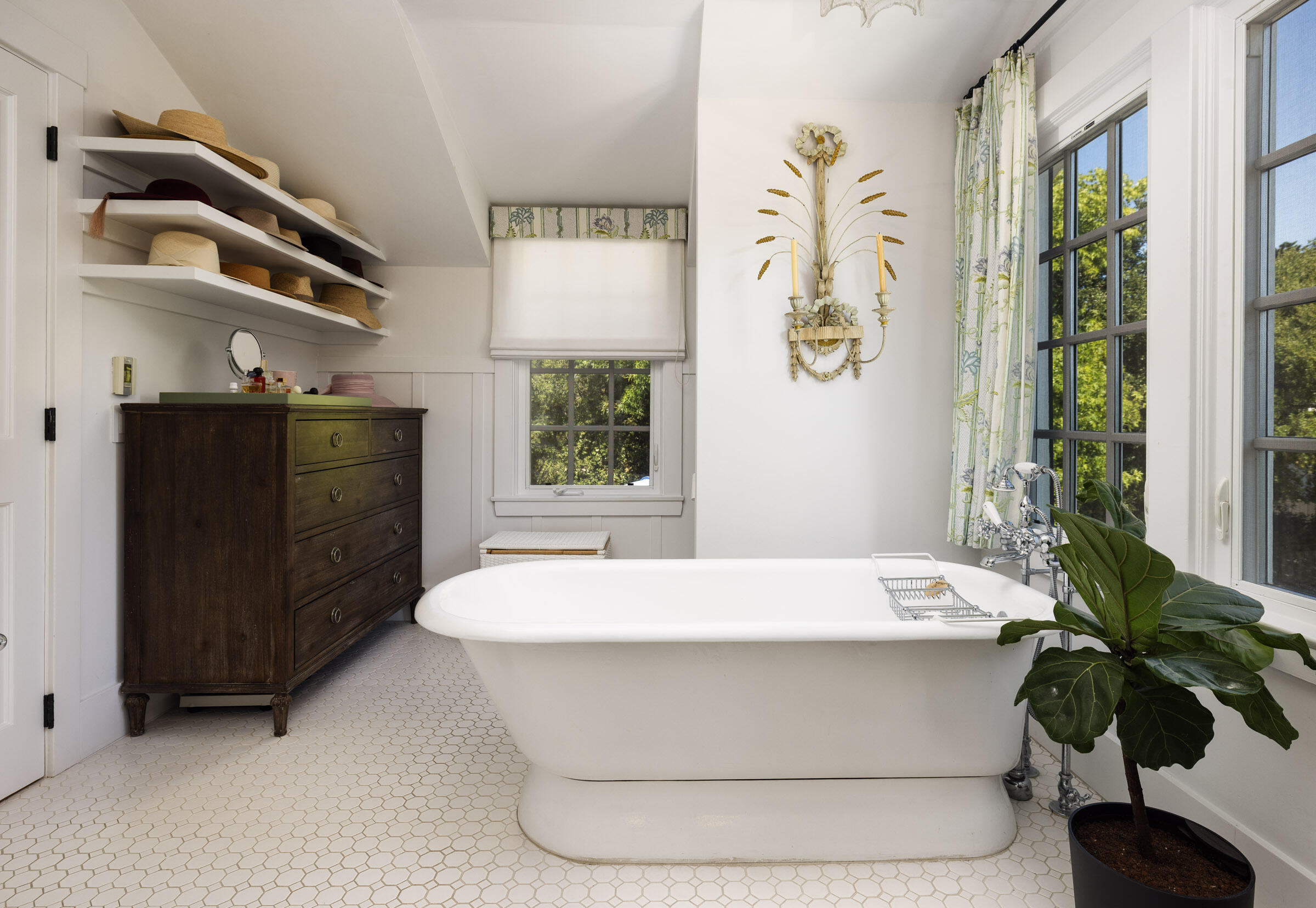 1166 Summit Road Montecito, CA 93108 - Photo 15 of 42 a living room with a bed and paintings on the wall