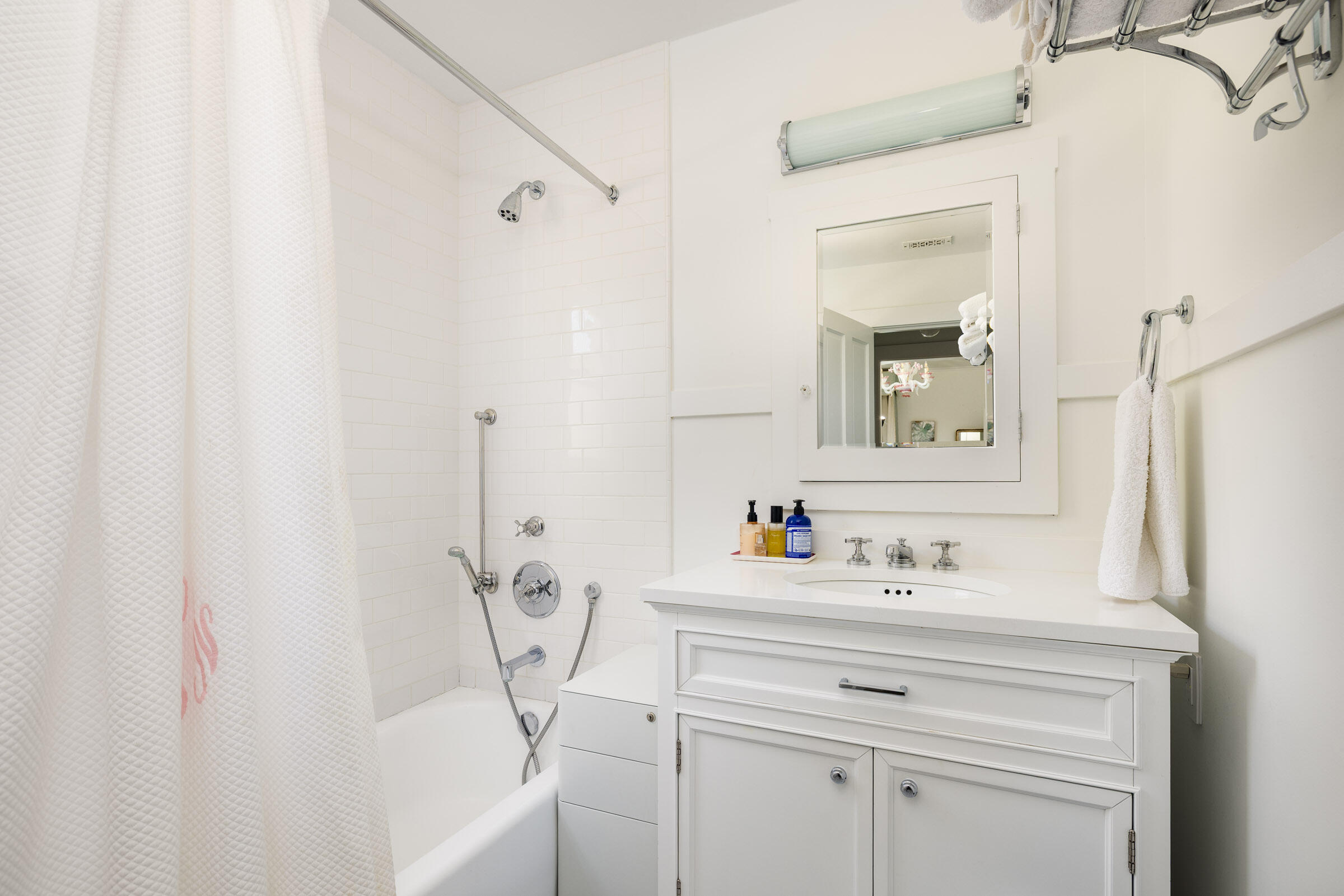 1166 Summit Road Montecito, CA 93108 - Photo 22 of 42 a bathroom with a sink vanity and mirror