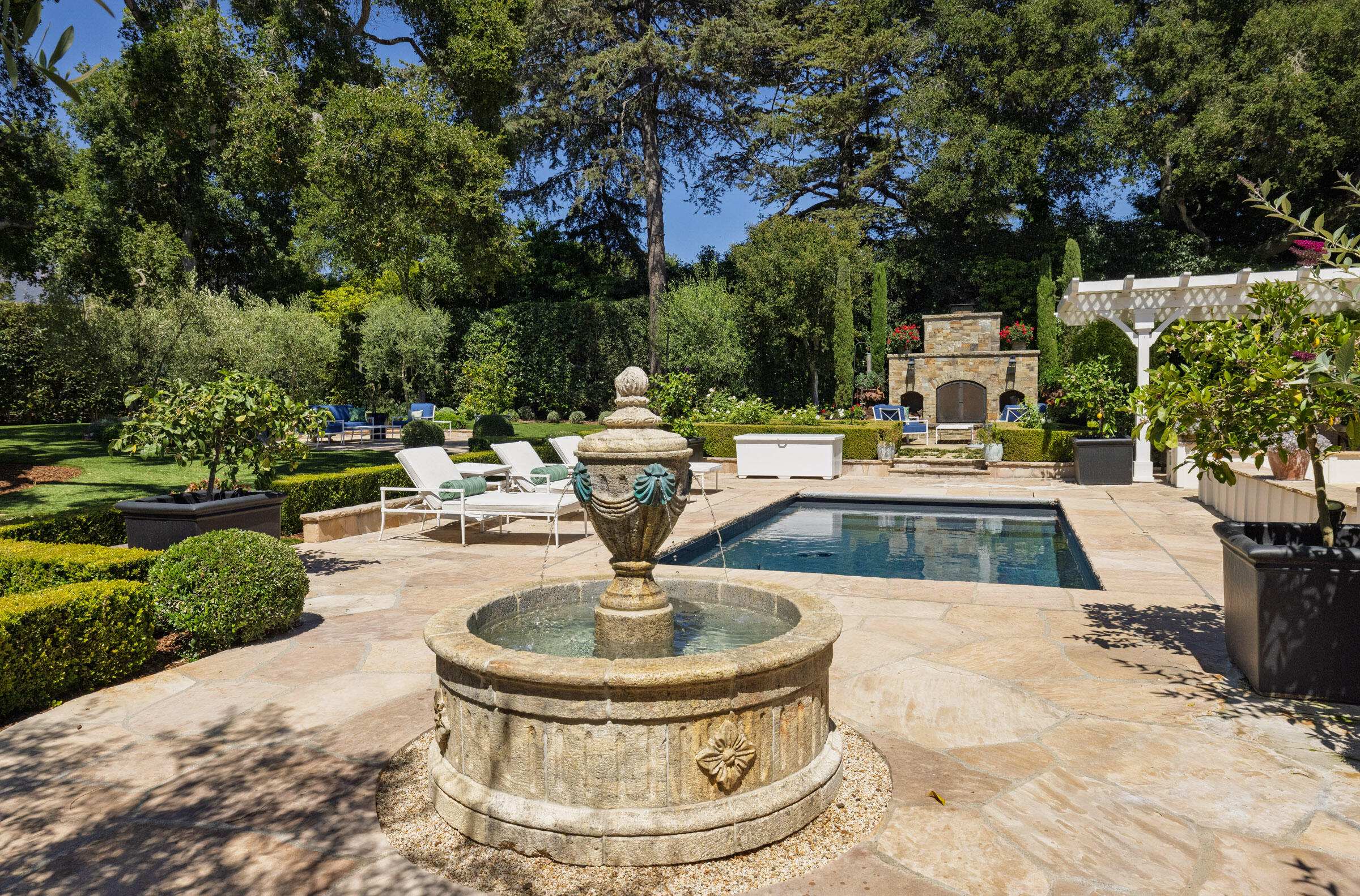 1166 Summit Road Montecito, CA 93108 - Photo 24 of 42 a view of a swimming pool with a patio