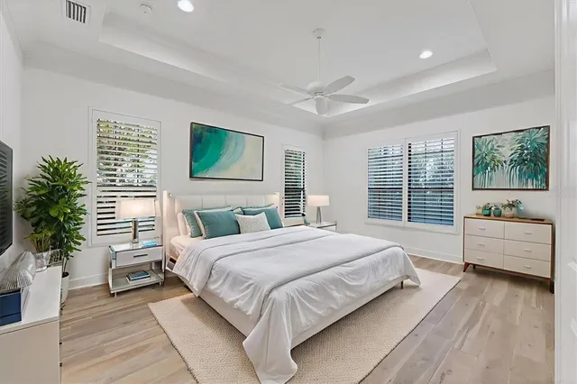 an aerial view of a house with garden space and street view