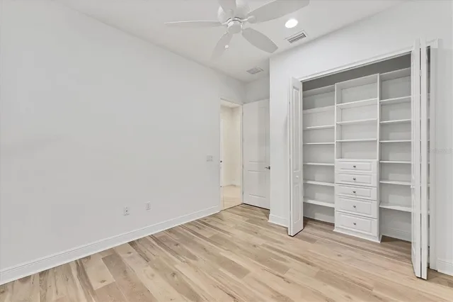 a view of a lake with a yard