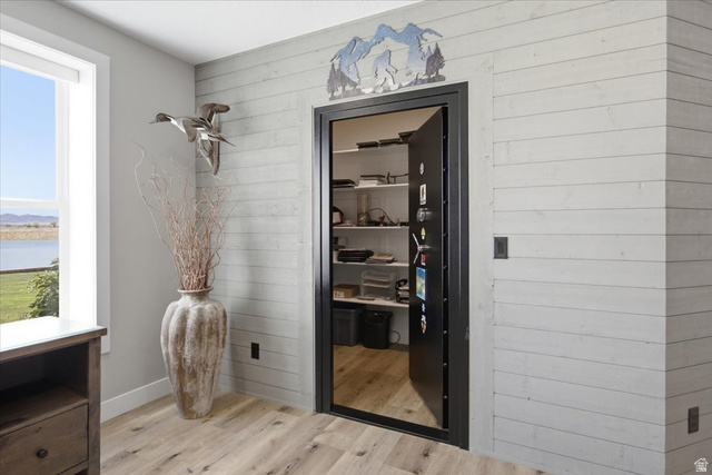 21 Pier Place Tooele, UT 84074 - Photo 72 of 112 Custom safe room featuring a heavy-duty door with internal shelving