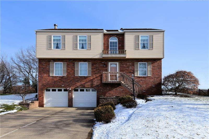 Move right into to this immaculate home located at 4978 Meadow Crest Drive in Hampton School District with concrete driveway and newer retaining wall.