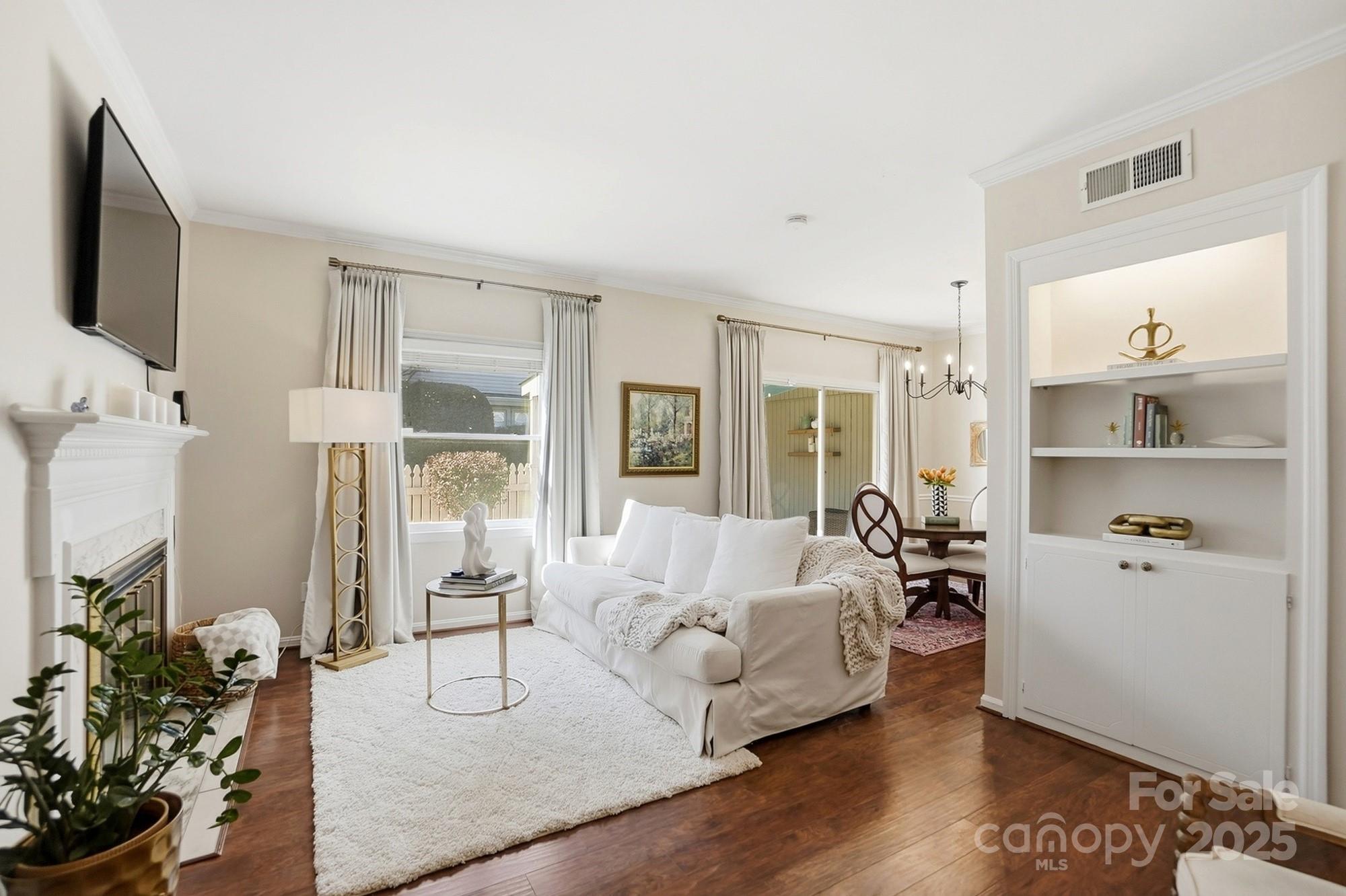 5913 Quail Hollow Road Charlotte, NC 28210 - Photo 13 of 47 a living room with furniture and a large window