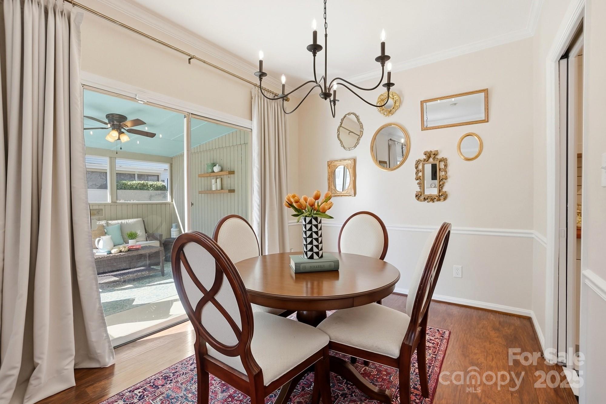 5913 Quail Hollow Road Charlotte, NC 28210 - Photo 14 of 47 a dining room with furniture and window