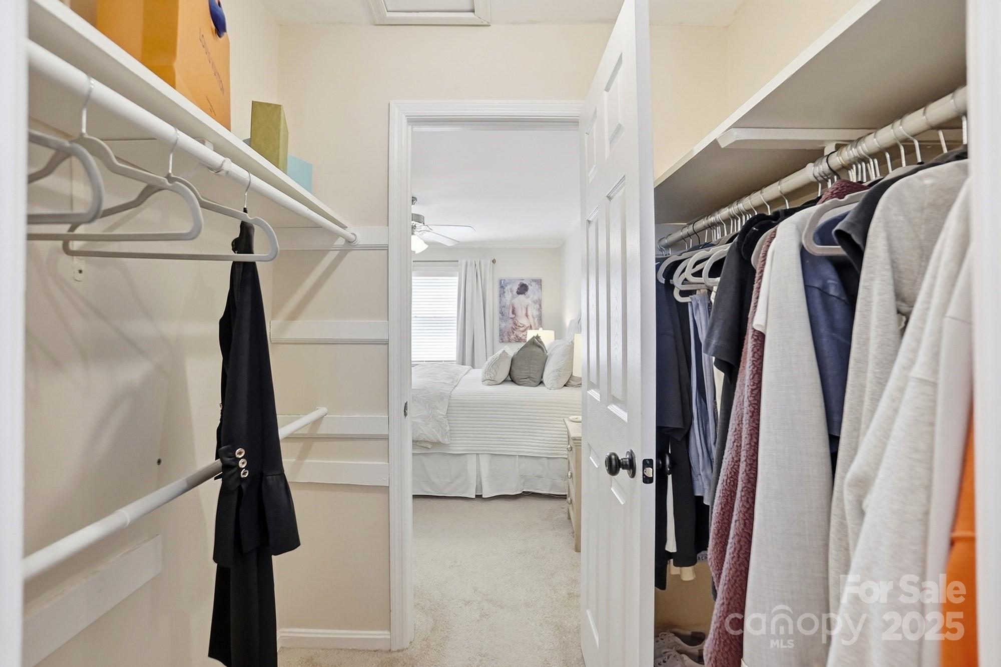 5913 Quail Hollow Road Charlotte, NC 28210 - Photo 34 of 47 a view of walk in closet with clothes and shoes