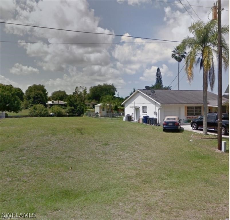 12409 River Road Fort Myers, FL 33905 - Photo 3 of 5 a house view with a garden space