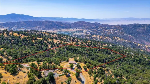 a view of a city with mountains in the background
