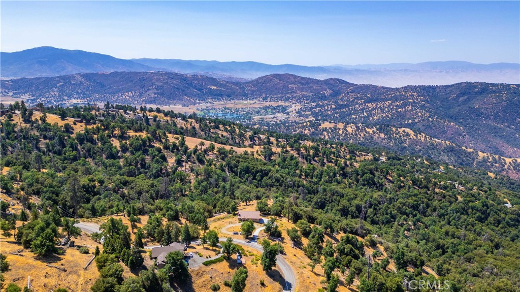 29600 Goldspike Road Tehachapi, CA 93561 - Photo 26 of 48 a view of a city with mountains in the background