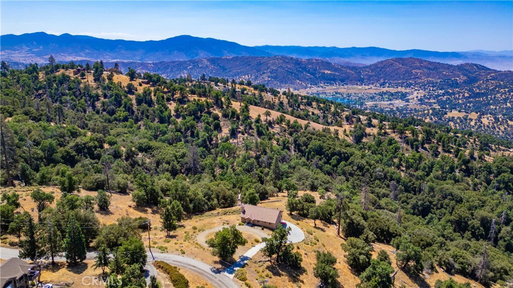 29600 Goldspike Road Tehachapi, CA 93561 - Photo 40 of 48 an aerial view of mountain and residential houses