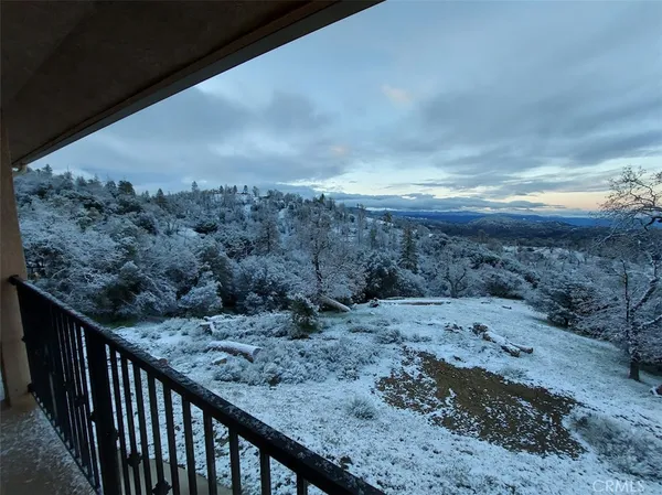 a view of a lake with a yard