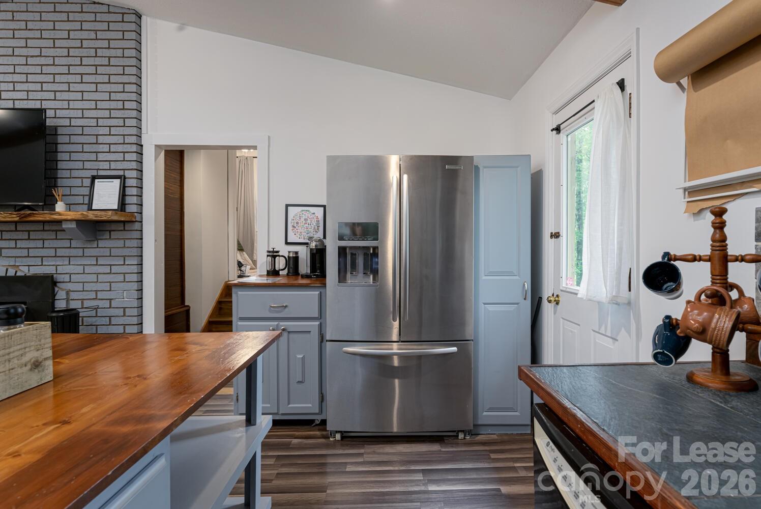 260 Allison Hill Road Brevard, NC 28712 - Photo 24 of 41 a kitchen with stainless steel appliances granite countertop a refrigerator and a stove top oven