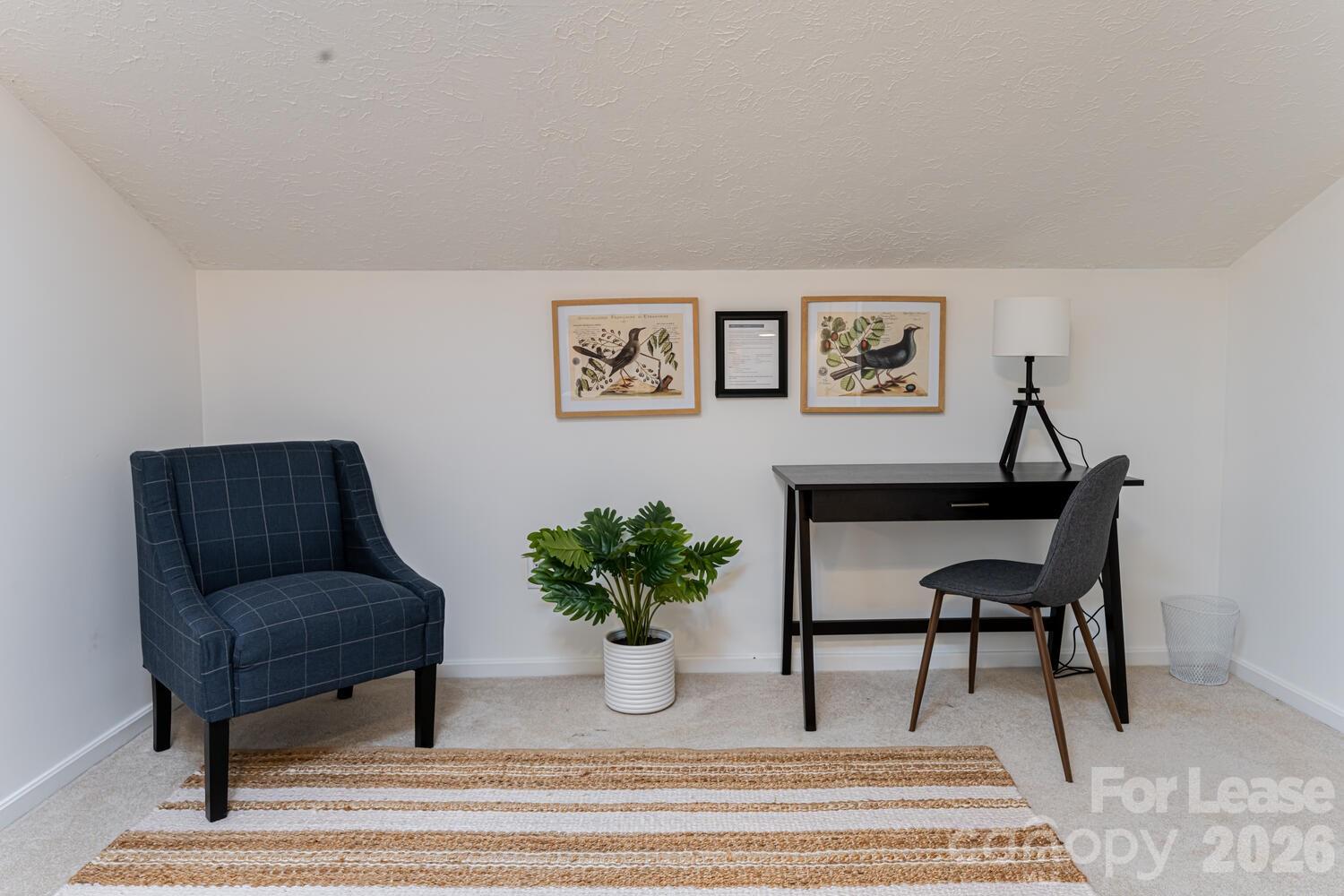 260 Allison Hill Road Brevard, NC 28712 - Photo 28 of 41 a living room with furniture and a potted plant