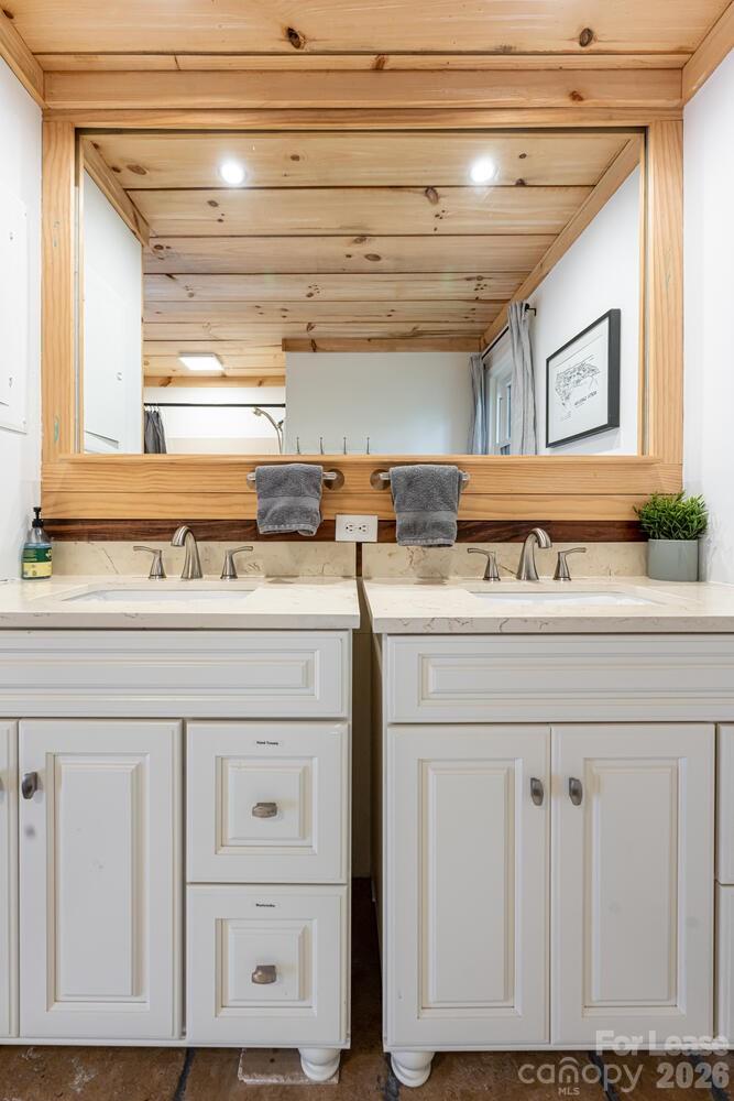 260 Allison Hill Road Brevard, NC 28712 - Photo 35 of 41 a utility room with stainless steel appliances granite countertop a sink and a window
