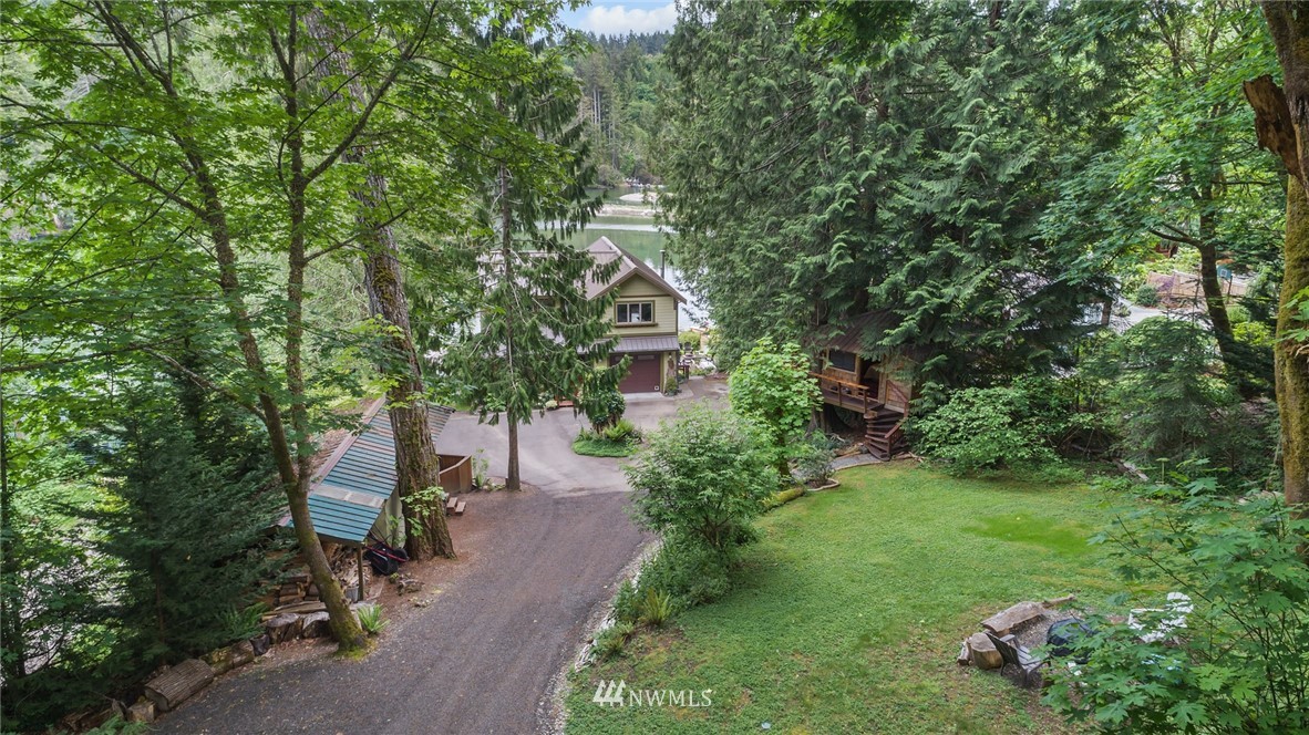 5909 Crescent Beach Road Northwest Vaughn, WA 98394 - Photo 34 of 35 a garden view with a seating space