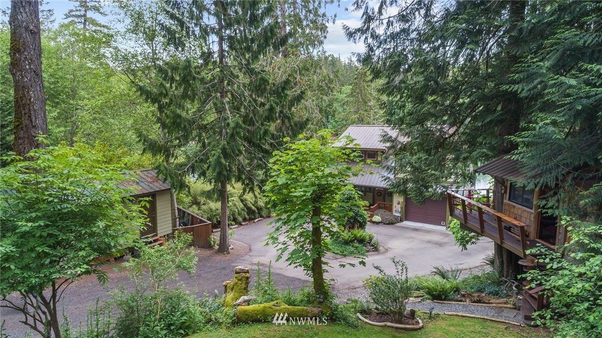 5909 Crescent Beach Road Northwest Vaughn, WA 98394 - Photo 8 of 35 a view of a garden with plants