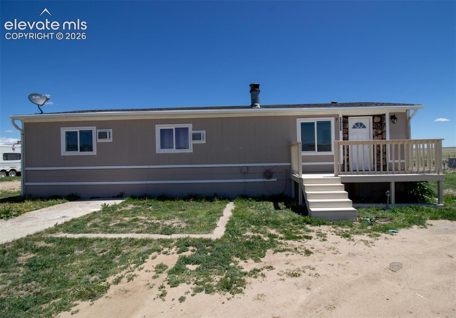 3425 Wiesner Road Calhan, CO 80808 - Photo 3 of 25 - View of rear view of property
