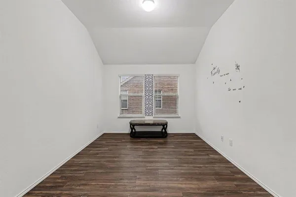a view of a room with a window