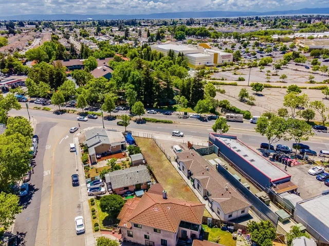 an aerial view of a city with lots of residential buildings