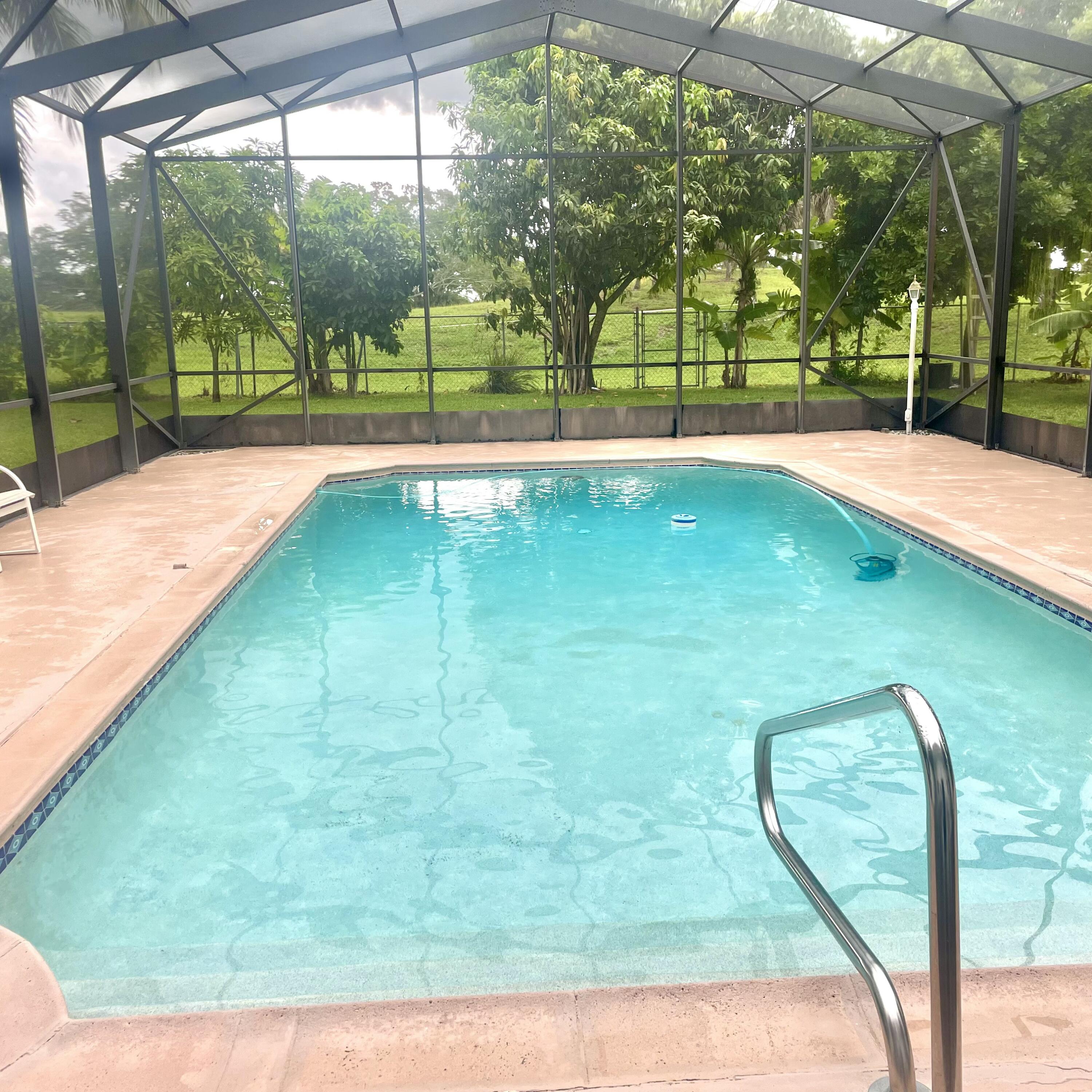 Undisclosed Address Royal Palm Beach, FL 33411 - Photo 1 of 5 a view of a backyard