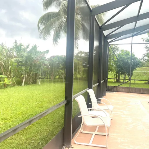 a view of an outdoor space with swimming pool