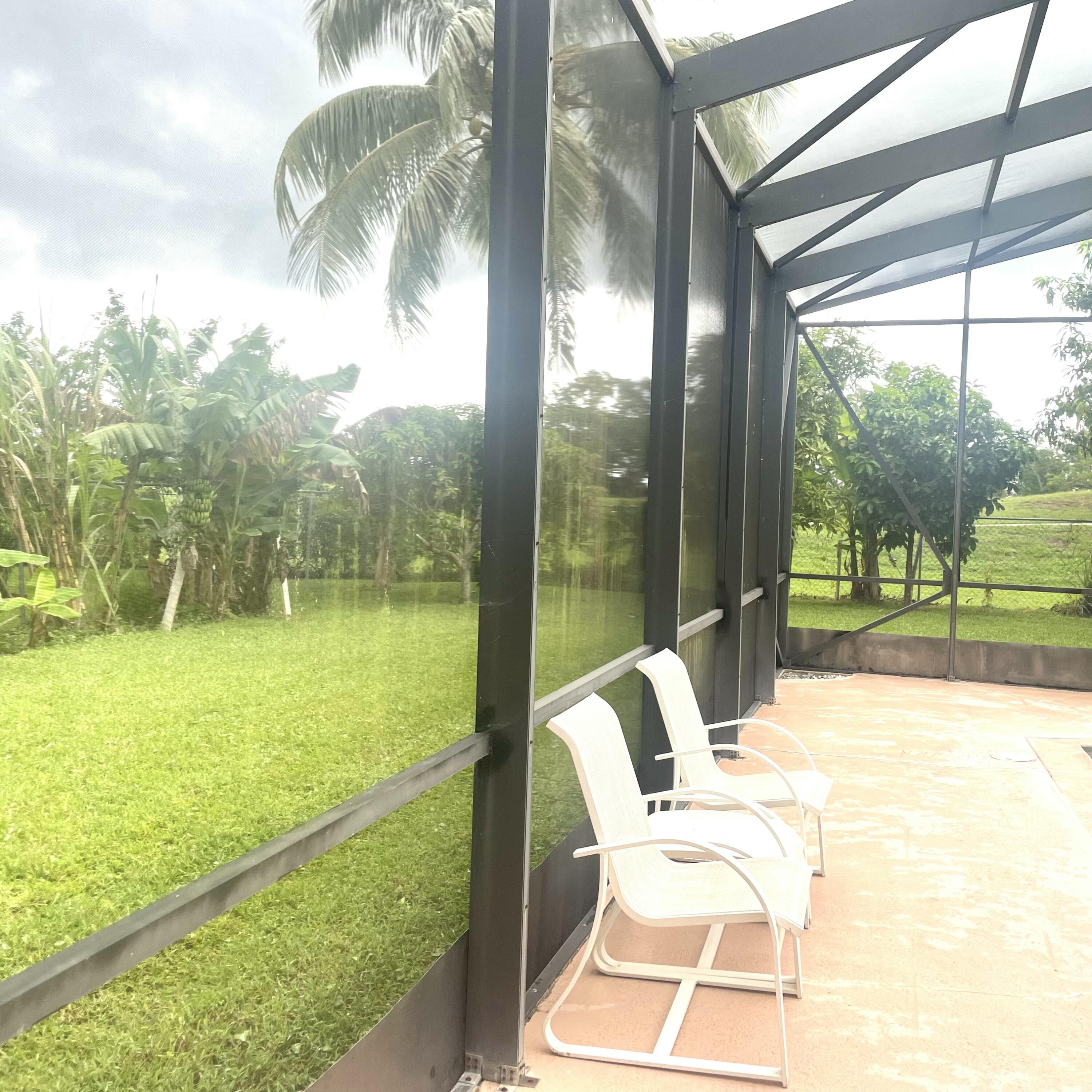 Undisclosed Address Royal Palm Beach, FL 33411 - Photo 2 of 5 a view of an outdoor space with swimming pool